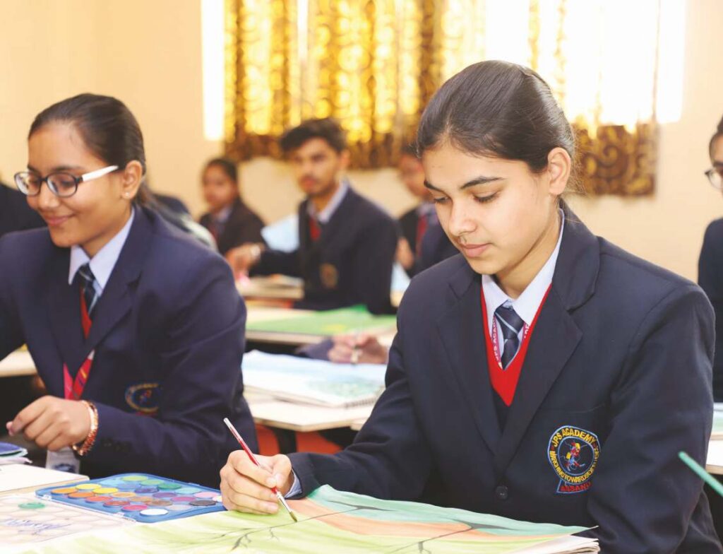 Senior students painting in class